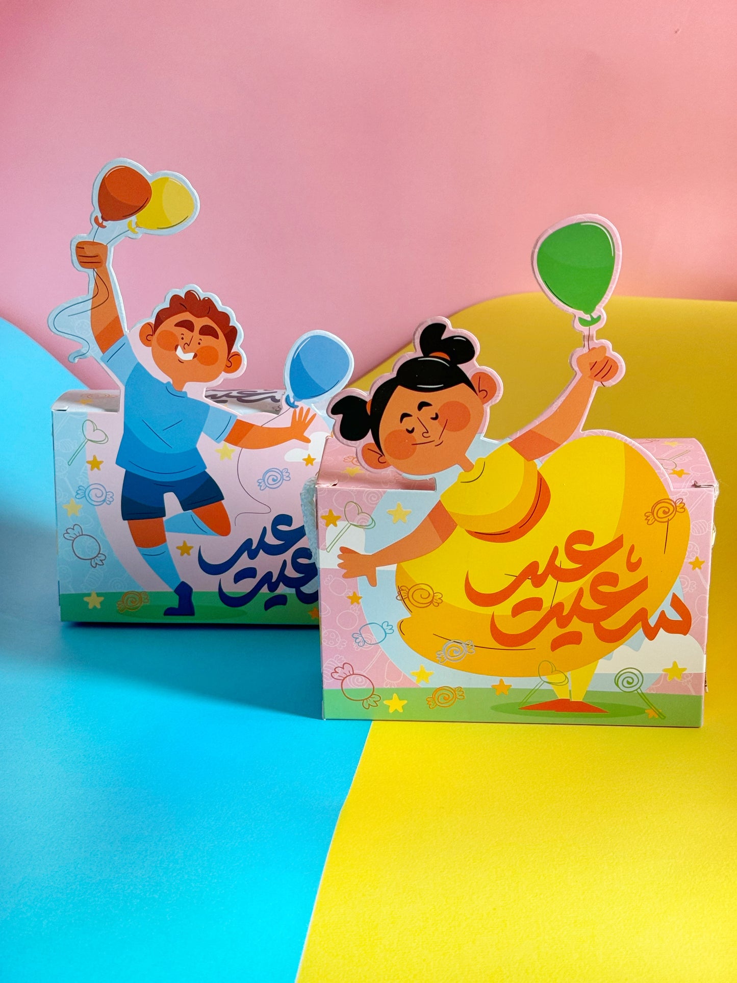 Both Eid Joy Bag variants (Boy & Girl) side by side, showing their colorful designs and exciting contents for kids.