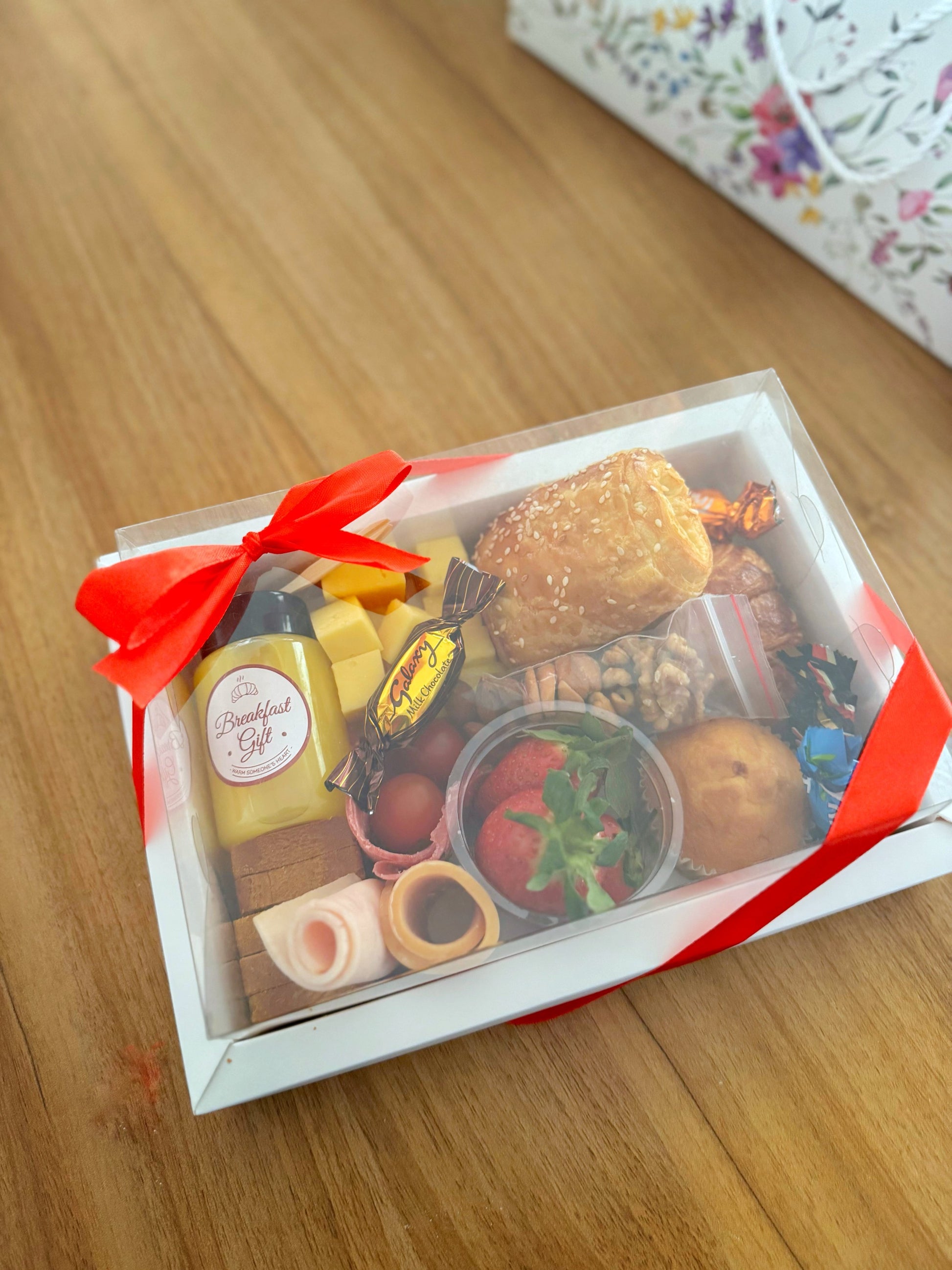 Premium Box – Single box with red ribbon and clear lid, gift-ready presentation