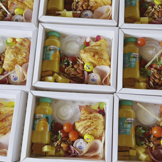 A short video showcasing the Team Fuel Box from various angles, highlighting its premium ingredients, custom wrapping, and elegant presentation for corporate gifting.