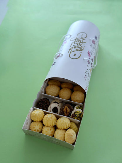 The Grand Kahk Box – Open tray at angle showing Ghraybeh, Plain Kahk, Date-Filled Kahk, and Petit-Four compartments